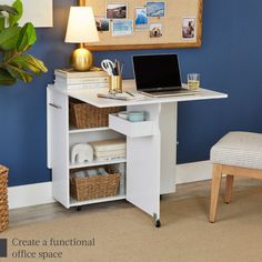 a laptop computer sitting on top of a white desk next to a chair and lamp