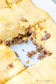 a close up of food on a plate with a bite taken out of the pie