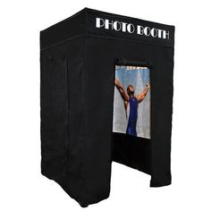 a black photo booth with an image of jesus on the front and bottom part of it