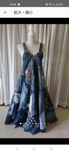 a dress made out of old jeans on display