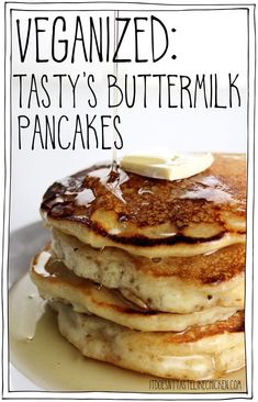 a stack of pancakes topped with butter and syrup on top of a white plate next to the words, veganized tasty's buttermik pancakes