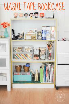 a book shelf filled with lots of books and crafting supplies on top of it