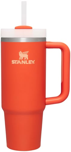 an orange travel mug with a straw sticking out of the lid and handle, on a white background