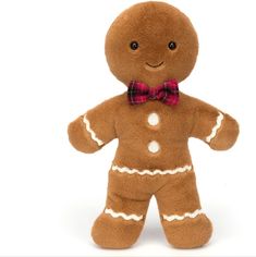 a gingerbread man stuffed animal with a bow tie