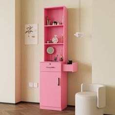 a pink cabinet in the corner of a room