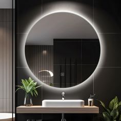 a bathroom with a round mirror above the sink