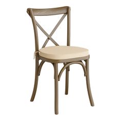 a wooden chair with a beige seat and back rest on a white background in front of a white backdrop