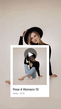 a woman sitting on the ground with her hands behind her head