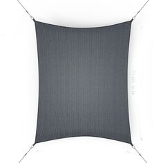 an overhead view of a black and white square pillow on a white background with the words,