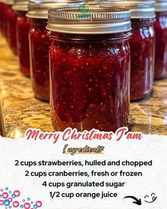 jars filled with jam sitting on top of a counter next to a sign that says merry christmas jam