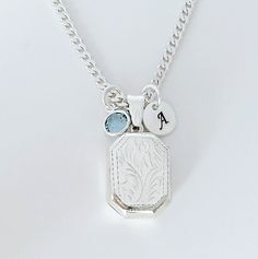 "Solid Sterling silver Locket Rectangle Necklace-  This piece will be a treasured keepsake! They're not only a trendy, stylish accessory, but also boast a rich and fascinating history.  This locket has a little bit of rim on both sides to hold two pictures in place without any glue!  The chains and Lockets I offer are solid 925 Sterling Silver Italy made, not silver or gold plated. . Take a look at other Locket designs: http://etsy.me/XKqYt8 . DESCRIPTION:  . Solid 925 Sterling silver Locket size:  20 mm L x 15 mm. . Sterling Silver disc 8mm with your chosen initial or heart 7mm upon request. . Swarovski birthstone of your choice month. . 925 Sterling Silver Italian Chains. I recommend curb chain for lockets!!   Need initials, charms, etc,? this link: http://etsy.me/UFmfXa . LOCKETS BY SHA Sterling Silver Vintage Charm Necklace For Gift, Elegant Silver Initial Pendant Locket Necklace, Elegant Silver Locket Necklace With Initial Pendant, Cheap Adjustable Silver Locket Necklace, Rectangular Etched Jewelry For Gifts, Silver Initial Pendant Locket Jewelry, Silver Sterling Charm Necklace With Detachable Pendant, Silver Charm Necklaces With Vintage Charm For Anniversary, Silver Jewelry Locket With Initial Pendant