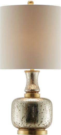 a table lamp with a white shade on it