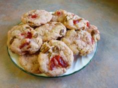 a plate full of cookies sitting on top of a table