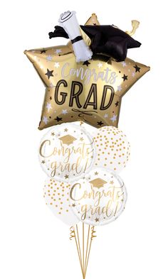 graduation balloons and confetti bouquets are arranged in the shape of a star