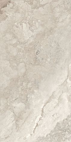 a white marble textured surface with grey veiners