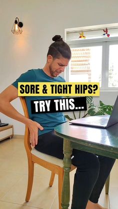 a man sitting at a table with his laptop on it and the words sore & tight hips? try this