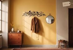 a coat rack and mirror in a yellow room