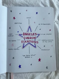 an open notebook with the words angels current exitions written in red, white and blue