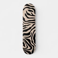 a black and white zebra print skateboard on a white background with the bottom part of the board visible