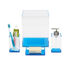 two toothbrushes, soap dispenser and lotion on a white background