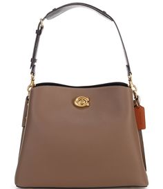 From COACH&#x2C; the Willow Colorblock Leather Shoulder Bag features:Polished pebble leatherTurn-lock closureInside snap pocketCenter zip compartmentDetachable handle Detachable strap for shoulder or crossbody wearFour protective feet at baseApprox. 12.5" L x 9" H x 4.5" W bag; 6" handle drop; 21.5" strap dropImported. Coach Willow Shoulder Bag, Modern Coach Pebbled Leather Shoulder Bag, Coach Brown Pebbled Leather Bag, Brown Pebbled Leather Coach Bag, Coach Pebbled Leather Bag For On-the-go, Brown Coach Shoulder Bag With Branded Hardware, Coach Willow, Luxury Coach Shoulder Bag With Turn-lock Closure, Designer Shoulder Bag