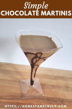 a chocolate martini in a glass with the words simple chocolate martinis written on it