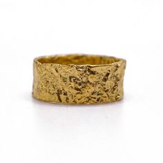 Hammered, molten and beautifully imperfect, this solid gold wide band ring is designed to encapsulate the powers of Goddess Athena - wisdom, courage and strength. This ring is one of our best sellers and is perfect for stacking, wearing as a thumb ring or alone.Our solid gold rings are made to order just for you, so please allow 2-3 weeks for dispatch. Solid Gold ring orders are final sale and cannot be exchanged or returned. We recommend placing an order for silver or gold plated first to ensure the size and design are perfect for you. Then, those pieces can be exchanged & applied to your solid gold version. Gold Thumb Ring, Gold Thumb Rings, Goddess Athena, Hammered Gold Ring, Athena Goddess, Wide Band Ring, Spike Earrings, Hammered Rings, Ring Stack