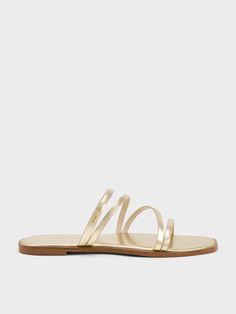 Elegant Gold Flat Slides, Elegant Gold Open Toe Slides, Elegant Gold Slides For Spring, Chic Metallic Sandals For Spring, Chic Gold Open Toe Slides, Elegant Metallic Sandals For Summer, Gold Slide Mules For Summer, Casual Gold Flip Flops For Spring, Chic Metallic Sandals For Summer