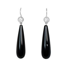 A stunning pair of earrings inspired by the Art Deco era. The tops feature two bezel-set old European cut diamonds with a total combined weight of approximately 1.11 carats, J-K color and VS1-VS2 clarity overall. Two pieces of polished onyx are set below the diamonds, each attached by a platinum link which allows movement. These earrings are handcrafted in platinum and the backs are Euro-backs. These earrings are approximately 1.7 inches in length. If you have any questions about the Windber Ear Estate Diamond Jewelry, Black Diamond Earrings, European Cut Diamonds, Art Deco Era, Perfect Engagement Ring, Accessories Jewelry Earrings, Unique Engagement Rings, Vintage Earrings, Black Diamond