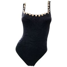 Sexy 90s MOSCHINO black velour bodysuit, encrusted with white pearls! Features a soft crushed velour that stretches to fit. Flat headed pearls adorn the top portion on the front and back. Can be worn as a bodysuit or a one piece swimsuit. Great with jeans, shorts or a skirt. In great condition. Made in Italy. Approximately Size Extra Small - Medium (lots of stretch) Measurements: 30-38 inch bust 24-32 inch waist Womens Tankini Swimwear, Fringe Swimsuit, 26 December, Retro Inspired Fashion, Black And White One Piece, Vintage One Piece, Vintage Moschino, Black And White Swimsuit, Clothes Board