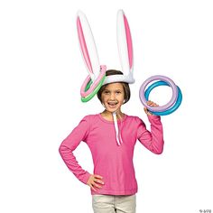 Inflatable Bunny Ears Ring Toss Game. What fun. After gobbling down candy and hunting for eggs Get kids active on Easter with this vinyl Inflate Bunny Ears Ring Toss Game. Watch in delight as kids try to toss all four 7 1/2" rings around the bunny ears of the included 16" hat. Played competitively or cooperatively this game is just plain fun. Hat ties on your head with two 16" straps. Luau Party Games, Pirate Fancy Dress, Rabbit Hat, Tropical Party Decorations, Ring Toss Game, Hawaiian Christmas, Easter Bunny Ears, Easter Games, Summer Party Decorations