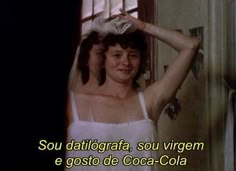 two women standing next to each other in front of a window with the caption saying, sou daltiogara, sou virgom e gosto de coca - cola