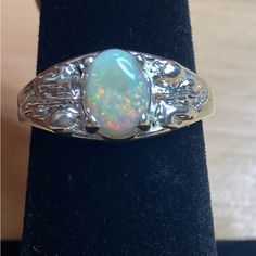 Beautiful Australian Opal From Coober Pedy Ring Set In Sterling Silver . Crystal Opal With Red , Green , Yellow, And Faint Blue . Smaller Stone , Not As Bright In Color . Fun Ring To Wear . Australian Opals Are The Most Sought After . Size 7 , Stone Is Aprox .60 Maybe A Bit Bigger , We Did Not Cut This One Dainty Diamond Band, Emerald Cut Eternity Band, Coober Pedy, Crystal Opal, Luxury Rings, Red Green Yellow, Rings Cool, Diamond Rings Bands, Fashion Board