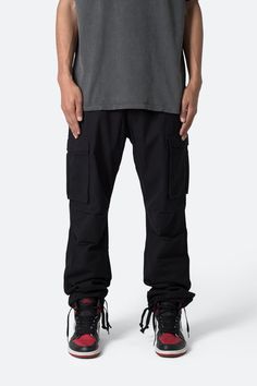 Vintage Cargo Pants - Black Sporty Parachute Pants With Cargo Pockets And Tapered Leg, Sporty Cargo Pants With Multiple Pockets And Tapered Leg, Combat Pants With Multiple Pockets, Sporty Tapered Leg Cargo Pants With Multiple Pockets, Techwear Bottoms With Tapered Leg And Multiple Pockets, Combat Style Relaxed Fit Cargo Pants With Pockets, Combat Style Cargo Pants With Hip Pockets, Combat Cargo Pants With Relaxed Fit And Side Pockets, Combat Cargo Pants With Side Pockets