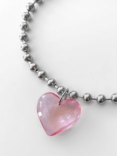 Let this piece do all the talking for you! Meet the limited edition 'LIA' necklace - from a stunning glass heart pendant to stainless steel ball chain, this piece will easily add the perfect touch to any outfit. Trust us, compliments are waiting! ♥ Made with a large pink glass heart pendant and stainless steel ball chain ♥ Waterproof & rust-free ♥ This is a limited edition drop! When these babies sell out, it's forever Available in lengths 14", 15", 16", 18", 20". Model is wearing 14". Handmade Trendy Pink Sterling Silver Necklaces, Trendy Pink Sterling Silver Necklace, Heart Shaped Ball Chain Necklace For Gift, Valentine's Day Gift Ball Chain Necklace, Heart Shaped Ball Chain Necklace For Valentine's Day, Heart-shaped Ball Chain Necklace Gift, Cute Pink Heart-shaped Necklace, Heart-shaped Ball Chain Necklace For Valentine's Day, Cute Pink Heart-shaped Charm Necklace