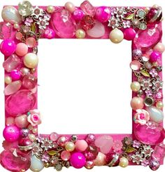 a pink frame with pearls and jewels on it