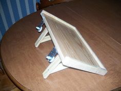 a wooden frame sitting on top of a table