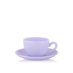 a purple cup and saucer on a white background