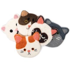 four cat and mouse slippers are shown