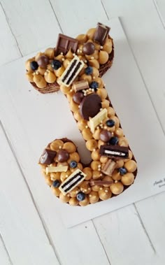 the number five is made out of cookies and candy