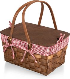 a picnic basket with red and white checkered fabric tied around the handle, on a white background