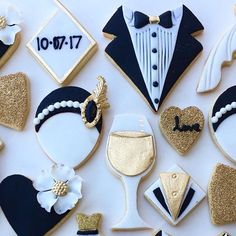 decorated cookies are arranged in the shape of men's suits and women's hats