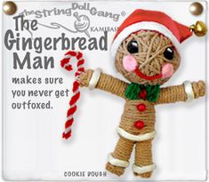 the gingerbread man is holding a candy cane