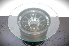 a glass plate with some wheels on it