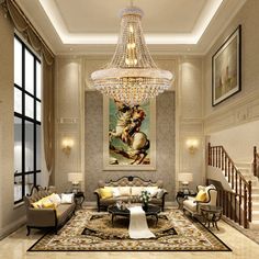 an elegant living room with chandelier, couches and paintings on the wall