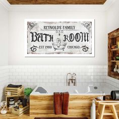 a bath room with a tub and a sign on the wall