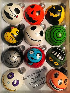 an assortment of halloween ornaments in a box