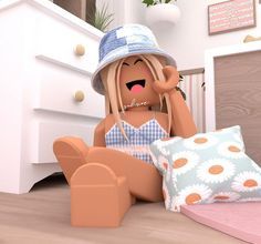 a cartoon doll sitting on the floor with pillows