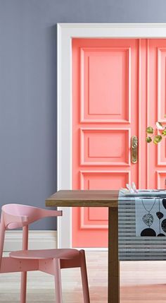 a table and chairs in front of a pink door with the words vasiar 2013 color trend picture perfect