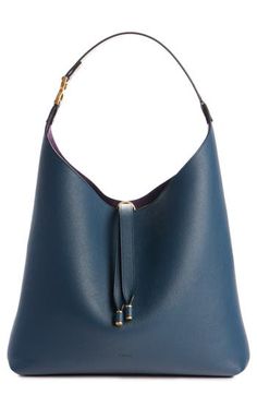 This slouchy calfskin-leather hobo bag blends a modern aesthetic with a '70s folk spirit, and of course has the Marcie line's signature slip-tassel closure. Tassel closure Shoulder strap Leather lining Leather Made in Italy Designer Handbags This brand has B Corp certification, representing business practices with emphasis on social and environmental performance, accountability and transparency This brand meets Nordstrom Responsible Brands criteria: brand adheres to responsible social and enviro Woman Bags Handbags, Chloe Marcie, Leather Hobo Bag, Bag Brand, Modern Aesthetic, Leather Hobo, Emphasis, Hobo Bag, Calf Skin